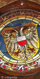 Wappenfenster im Gerichtssaal des Burgklosters Lübeck  -  Für eine größere Darstellung auf das Bild klicken.